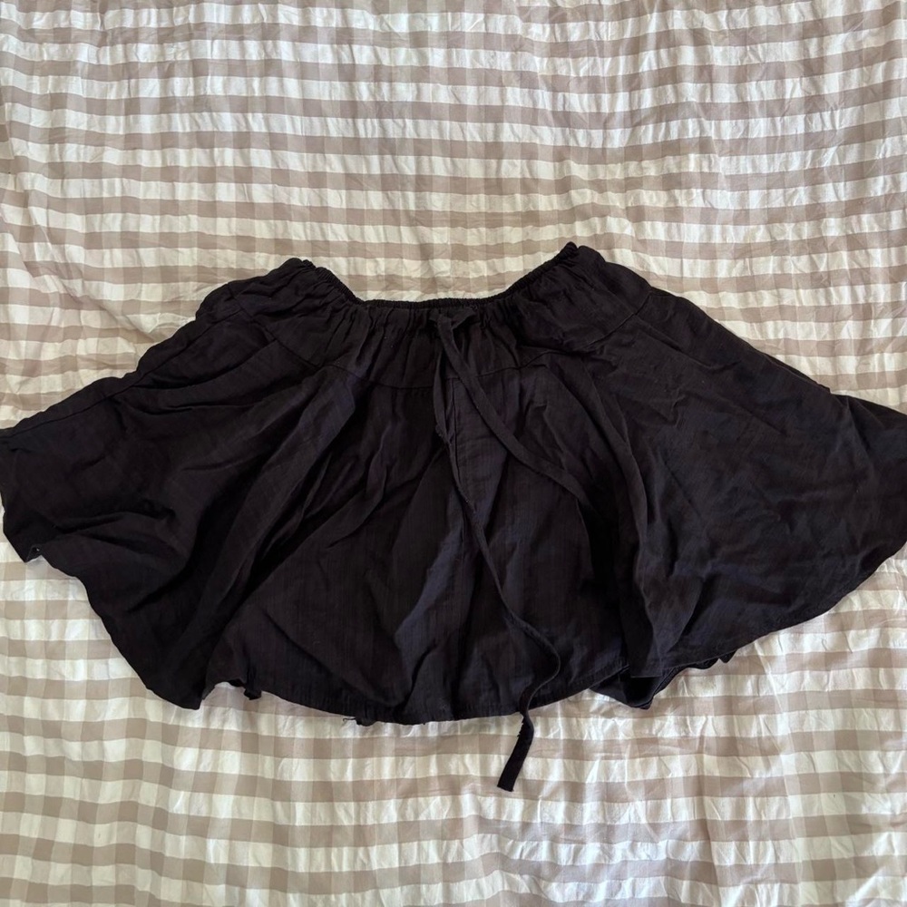 black mini flowy skirt